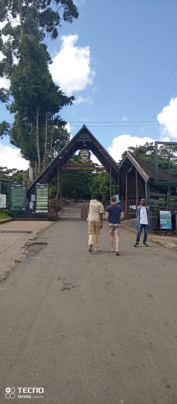 Guests arriving at Kilimanjaro National Park gate during an excursion